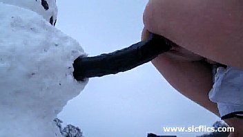 Crazy slut fucks a toilet brush and huge dildo in the snow