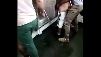 Dude gets fucked at a public bathroom urinal