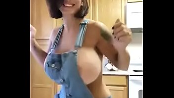 Busty gorgeous girl dancing in the kitchen in front of the webcam. Who is she?